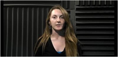 Examining the Role of Eye Movements During Conversational Listening in Noise